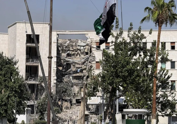 The Syrian Defense Ministry headquarters building was damaged after an Israeli airstrike. Photo: Anadolu. syria1.png
