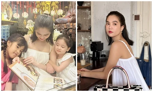 Ngọc Trinh mặc gợi cảm, đưa con gái đi ăn chay sau Tết