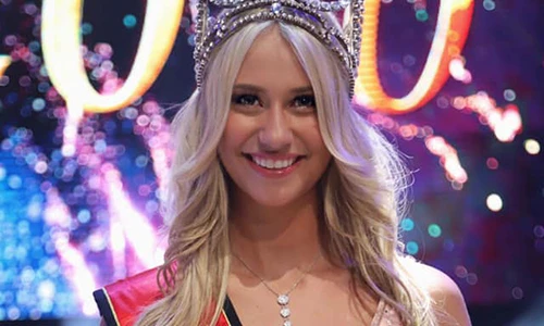 Nhan sắc hút hồn của tân Hoa hậu Bỉ vấp té, rơi áo ngực