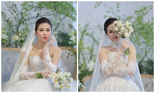 Vợ Huy Khánh hóa cô dâu gợi cảm khi về nước