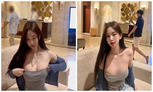 Hot girl siêu vòng 1 chỉnh trang phục hớ hênh nơi công cộng