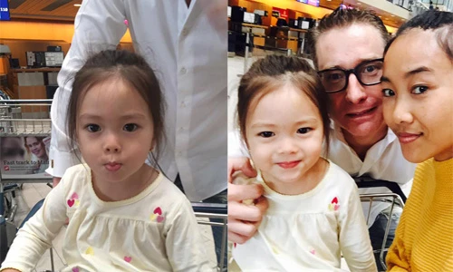 Đoan Trang bịn rịn chia tay chồng và con gái ở sân bay