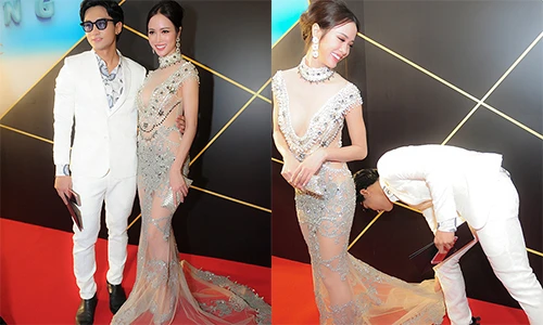 Ngọc Anh được bạn trai tin đồn chỉnh váy trên thảm đỏ