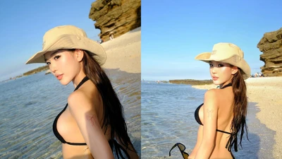 Wyn Anh nóng bỏng với bikini nhỏ xíu, khoe dáng trên biển