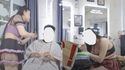 Xôn xao nhân viên nữ một tiệm cắt tóc ăn mặc táo bạo trong khi phục vụ khách
