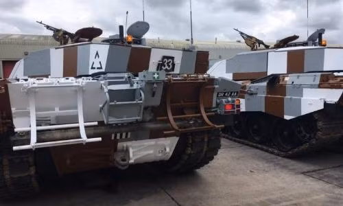 Ngã mũ kính phục khả năng ngụy trang của Quân đội Anh