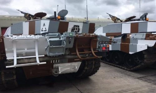 Ngã mũ kính phục khả năng ngụy trang của Quân đội Anh