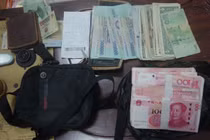 Hai người quốc tịch Trung Quốc vận chuyển trái phép tiền tệ