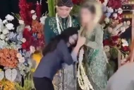 Người yêu cũ cố hôn tay chú rể, cô dâu mất bình tĩnh trên sân khấu