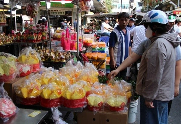 Gallery - Rực sắc bánh 'tài lộc' ở chợ người Hoa TP HCM ngày vía Thần Tài | Báo Tri thức và Cuộc sống - TIN TỨC PHỔ BIẾN KIẾN THỨC 24H