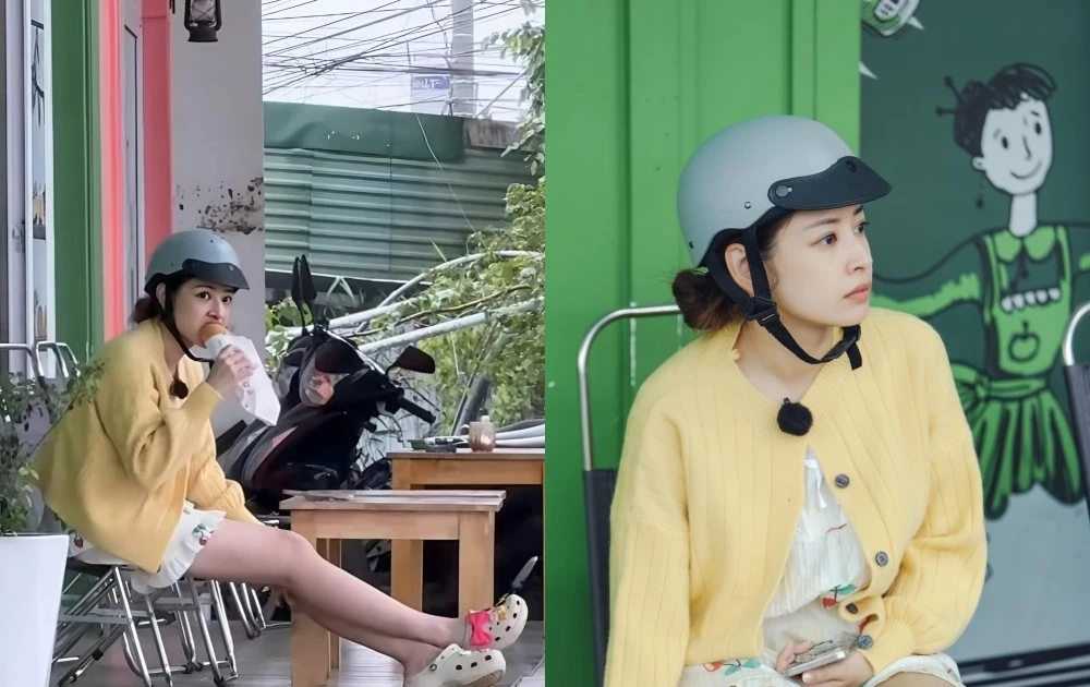 View - Chi Pu mặc đồ ngủ, đội mũ bảo hiểm gặm bánh mì lề đường | Báo Tri thức và Cuộc sống - TIN TỨC PHỔ BIẾN KIẾN THỨC 24H