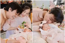 Vợ chồng Cao Minh Đạt hạnh phúc trong tiệc đầy tháng con gái