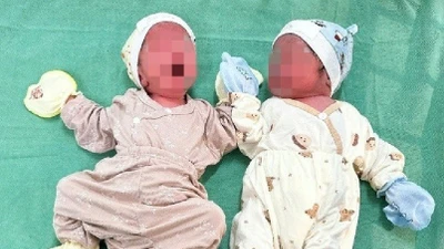 Người phụ nữ 52 tuổi sinh đôi 2 bé gái khỏe mạnh 