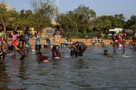 Cuộc sống đời thường bên bờ sông Niger qua ảnh