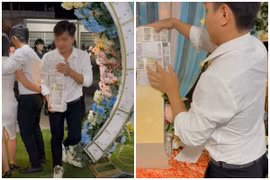 Chàng trai cầm 7 cọc tiền mừng cưới, nhìn mệnh giá phì cười