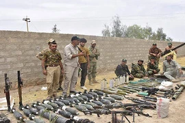 Chùm ảnh tịch thu kho vũ khí “khủng” của IS ở Mosul