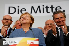 Ảnh: Thủ tướng Merkel "thắng lợi đắng cay" trong bầu cử Đức