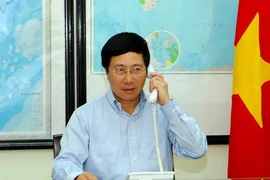 Bộ trưởng Ngoại giao điện đàm với Ủy viên Quốc vụ Trung Quốc