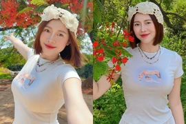 Việt Phương Thoa khoe sắc ngọt ngào bên hoa phượng đồi A1 lịch sử