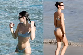 “Tóm dính” nàng mẫu diện bikini nhỏ xíu đi tắm biển cùng bạn trai