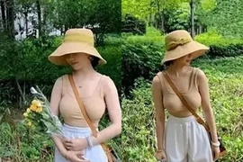 Bé gái “Bố ơi mình đi đâu thế” diện áo bó gây tranh cãi