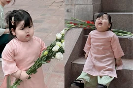 Chụp ảnh áo dài với mỡ bụng ''phè phỡn”, em bé đốn tim netizen