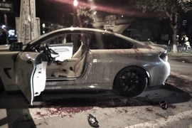 Hai người đi xe BMW bị chém vì tiếng pô quá to 