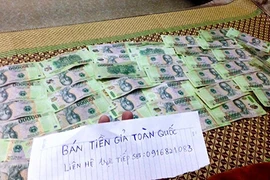 Mua bán tiền giả nhan nhản trên mạng xã hội