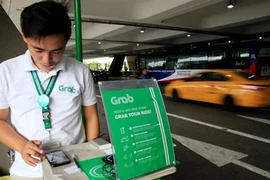 Grab bị phạt gần 7 tỷ đồng sau khi "nuốt gọn" Uber