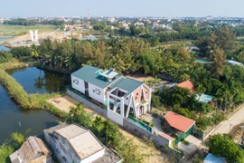 Kiến trúc lấy cảm hứng từ cây dừa trong biệt thự ở Hội An
