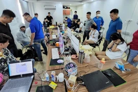 Lực lượng công an bắt giữ các đối tượng có liên quan cùng tang vật vụ án.