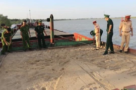 Số cát không rõ nguồn gốc được lực lượng chức năng thu giữ. Ảnh: Công an cung cấp.