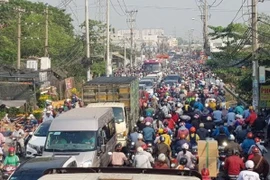 Quốc lộ 50 qua huyện Bình Chánh thường xuyên xảy ra tình trạng ùn tắc.