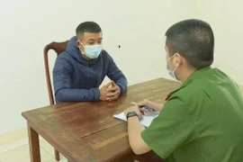 Đối tượng Nguyễn Văn Thiện tại cơ quan công an.