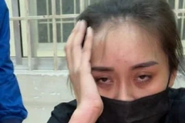 Nghi can Chu Thị Hoài bị công an bắt giữ.