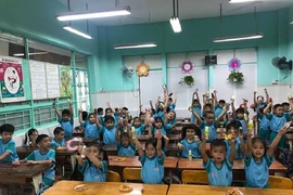 Từ 10-3: Gia đình sinh 2 con một bề được miễn, giảm học phí