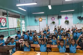 Từ 10-3: Gia đình sinh 2 con một bề được miễn, giảm học phí