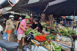 Người dân tại Phân vùng 1 ở Hà Nội sẽ đi chợ theo phiếu được phát (ảnh: NT)