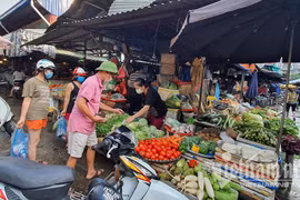 Người dân tại Phân vùng 1 ở Hà Nội sẽ đi chợ theo phiếu được phát (ảnh: NT)