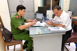 Ông Tất Thành Cang tại Cơ quan Công an