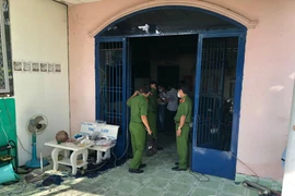 Cơ quan chức năng khám nghiệm hiện trường vụ cháy