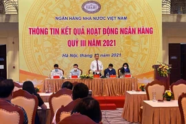 Phó thống đốc NHNN Đào Minh Tú phát biểu tại buổi họp báo.