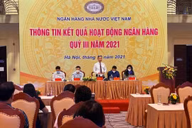 Phó thống đốc NHNN Đào Minh Tú phát biểu tại buổi họp báo.