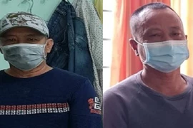 2 bị can Nguyễn Văn Nhơn (bên trái) và Huỳnh Văn Lấm. 