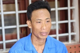 Trần Văn Cường khi bị bắt giữ tại Cơ quan điều tra.