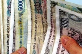 Ngân hàng Nhà nước yêu cầu khử khuẩn tiền cũ phòng Covid-19