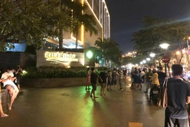 Người dân chạy từ lầu cao xuống sau khi nhận thông báo cháy tối 26/10.