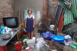 Nhà dân tan hoang sau bão Molave