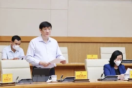 Bộ trưởng Bộ Y tế Nguyễn Thanh Long báo cáo công tác phòng, chống dịch. 