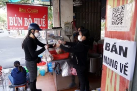 Hà Nội: Người dân thích ứng nhanh với quy định mới khi khu vực đổi màu cấp độ dịch